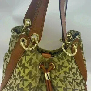 Michael Kors Authentic Monogrammed Bag. Tan Color